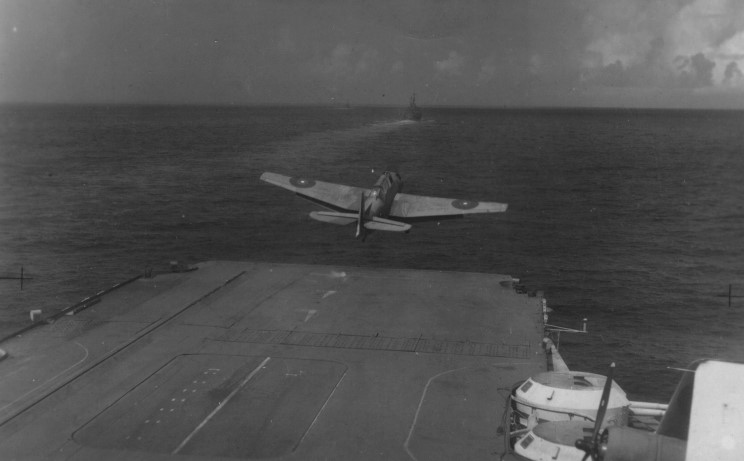 An Avenger takes off from what appears to be HMS VICTORIOUS. The roundels on the wings have obviously been hastily painted-over to make them conform to Eastern Fleet standards.