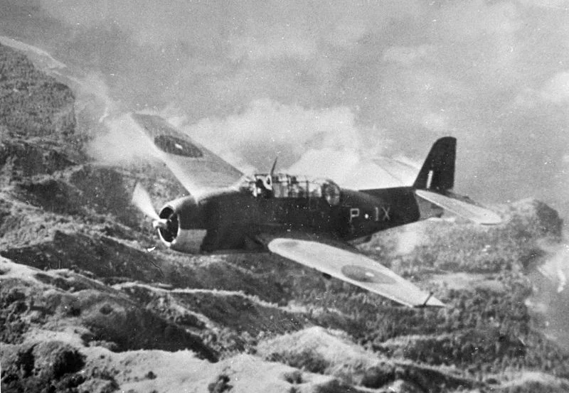 An Avenger from HMS VICTORIOUS crosses the Sumatran coast.