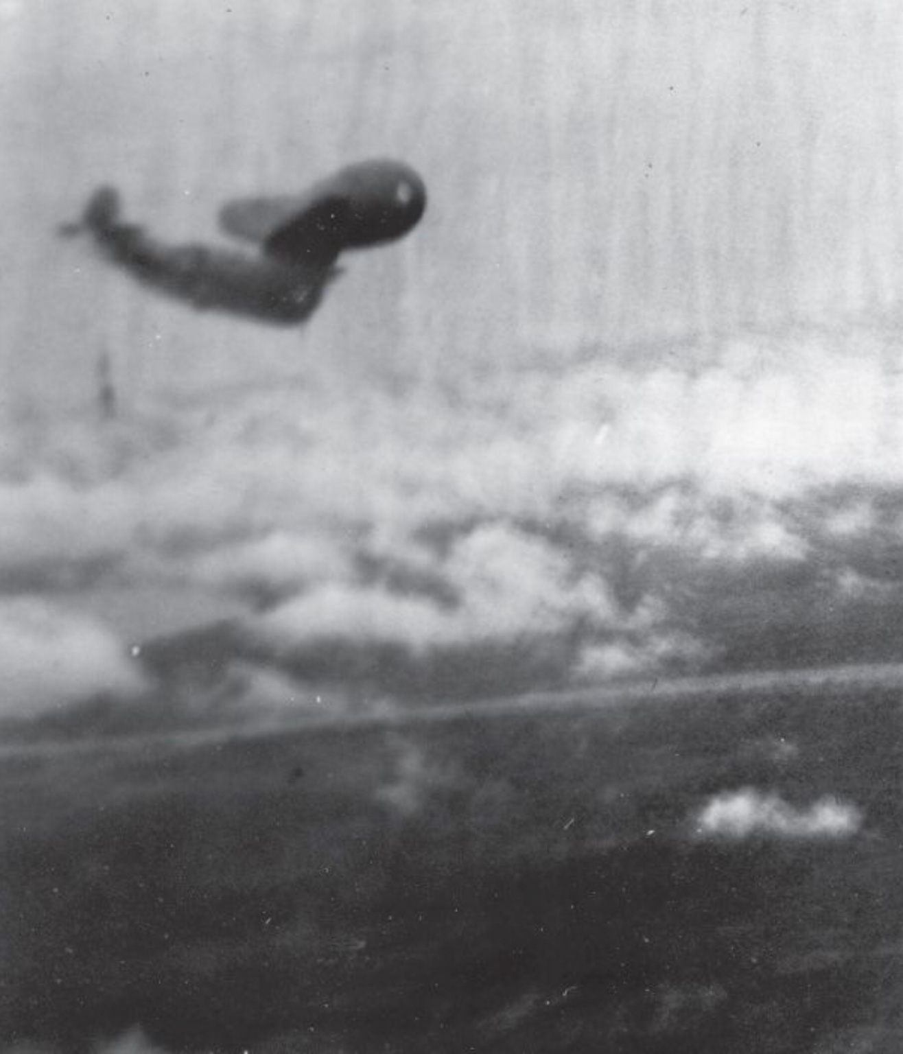 This picture, taken by the observer of an FAA Avenger as it dove on Soengi Gerong, shows another Avenger at the moment it struck a balloon cable.