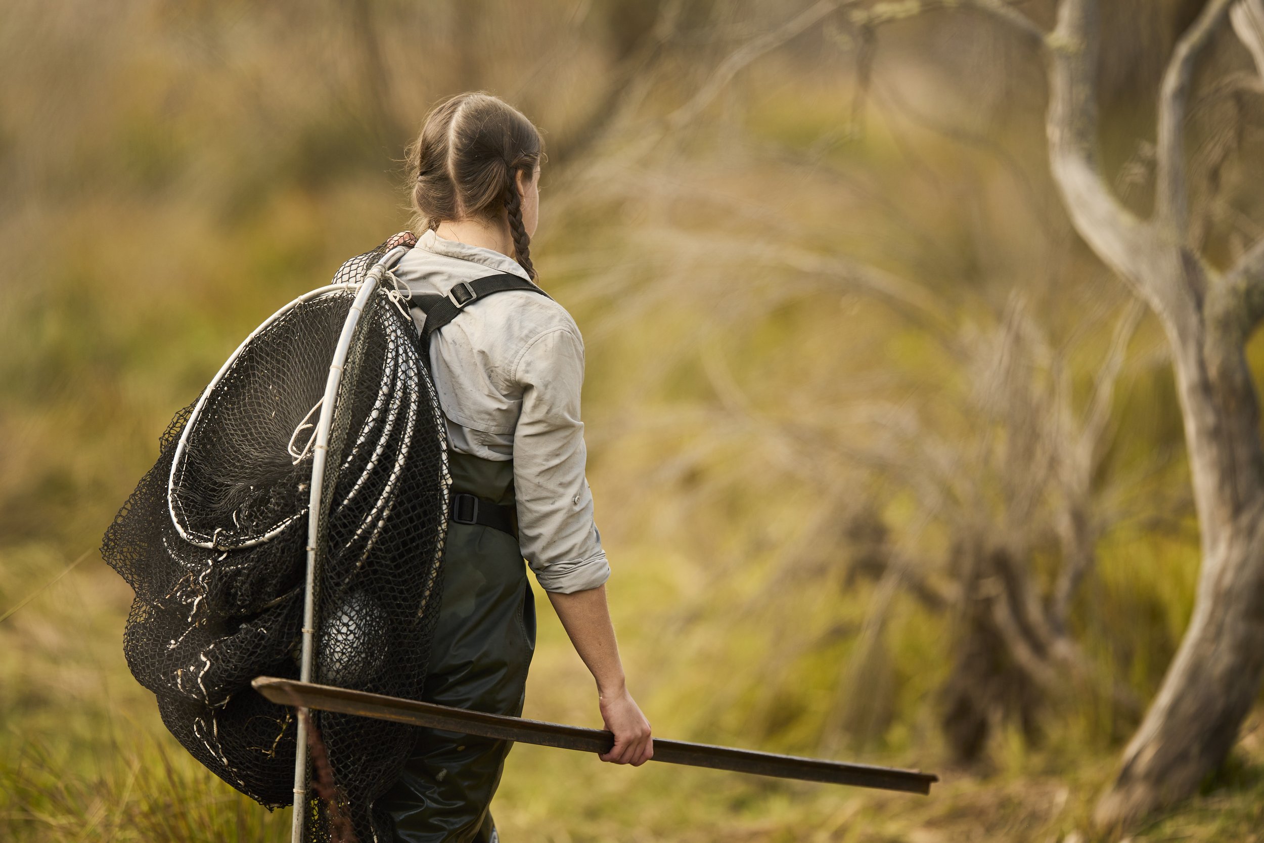  Walking to set nets during the Platypus rewilding program. 