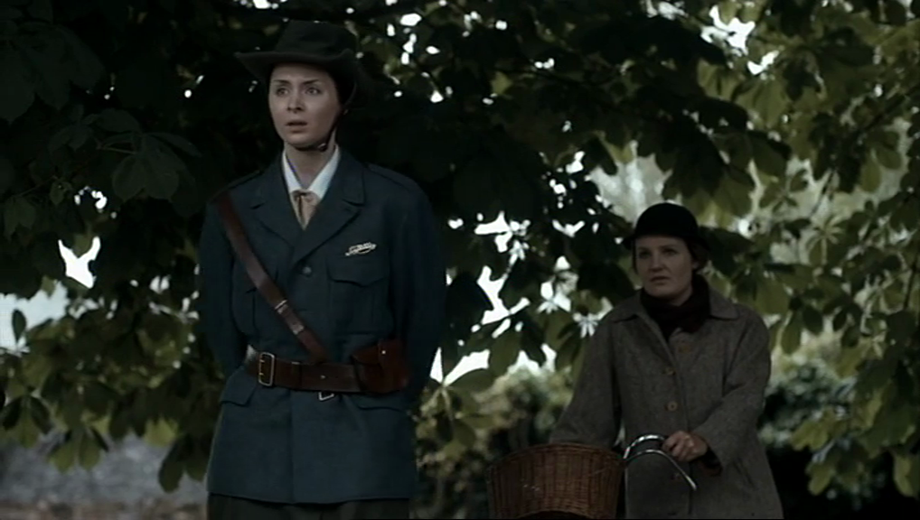 Cumman Na mBan members Bridget Grace (Gina Costigan) and May Cullen (Megan Cassidy) look on as The Sherwood Foresters arrive in Kingstown Harbour