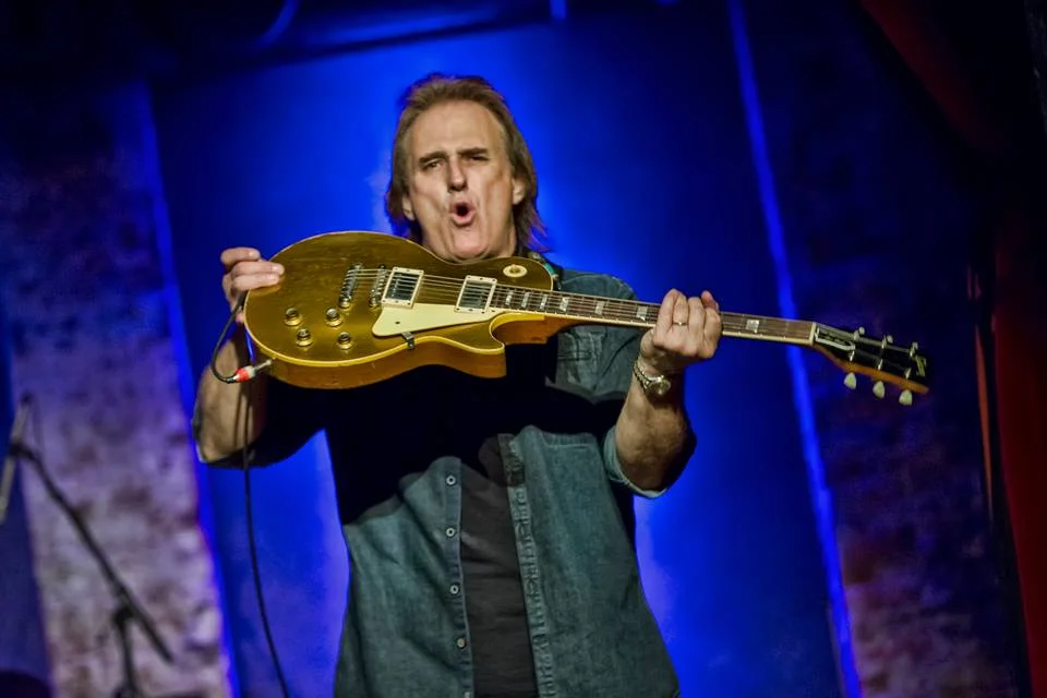 Rocky Athas with his vintage 1970 Gold Top "Dickey" in New York City. Photo courtesy of Arnie Goodman Photography.
