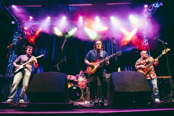 Rocky and the new band at the Granada Theater tribute for Bill Ellison. Walter Watson - drums and vocals, Jared Watson - rhythm guitar and vocals, Rocky Athas II - bass. Photo courtesy of Jay Simon.