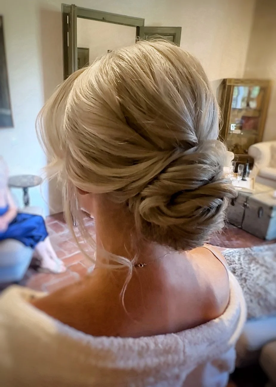 Low romantic bun updo