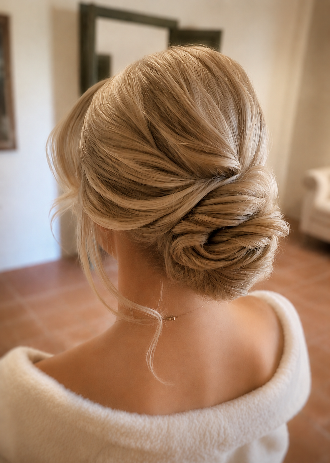 Low romantic bun updo destination luxury vip wedding makeup artist