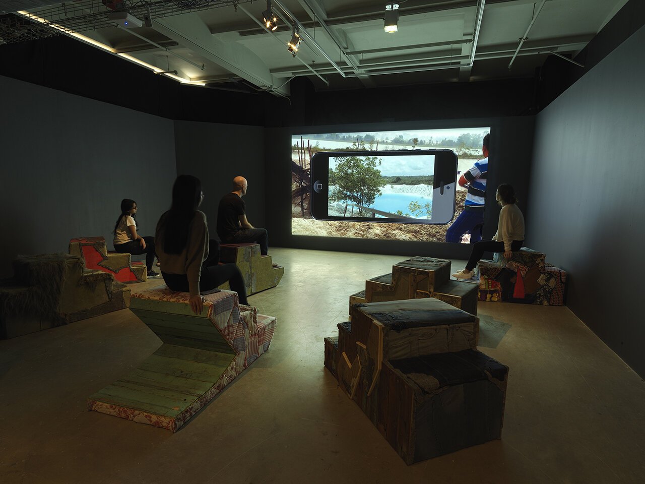  John Preus,  Stoop Culture  (seating), Aily Nash and Andrew Norman Wilson,  Image Employment  (screening),  Re: Working Labor,  Sullivan Galleries, School of the Art Institute of Chicago, 2019. Photo: Tom Van Eynde 