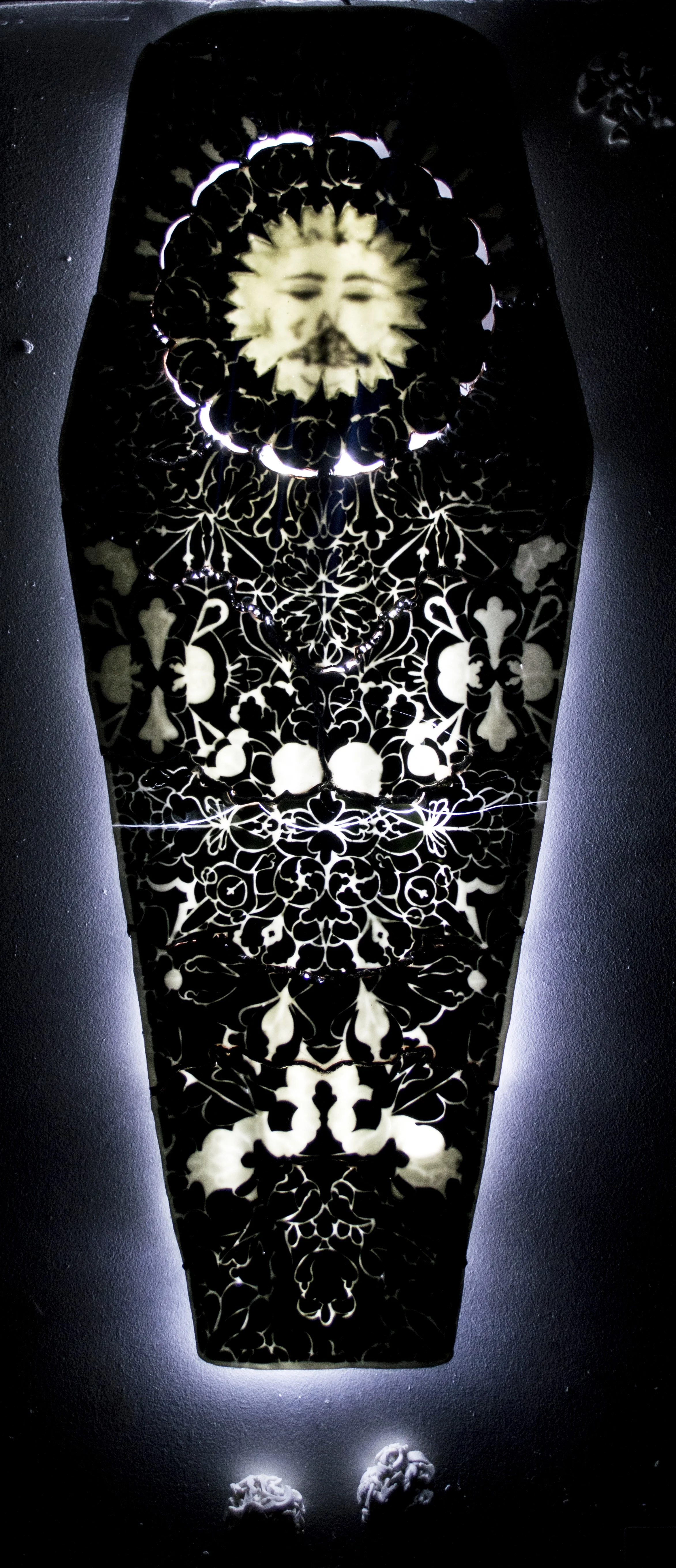 Gettner_Katelyn_Untitled (rose window coffin)_2014_ceramic, leds.JPG