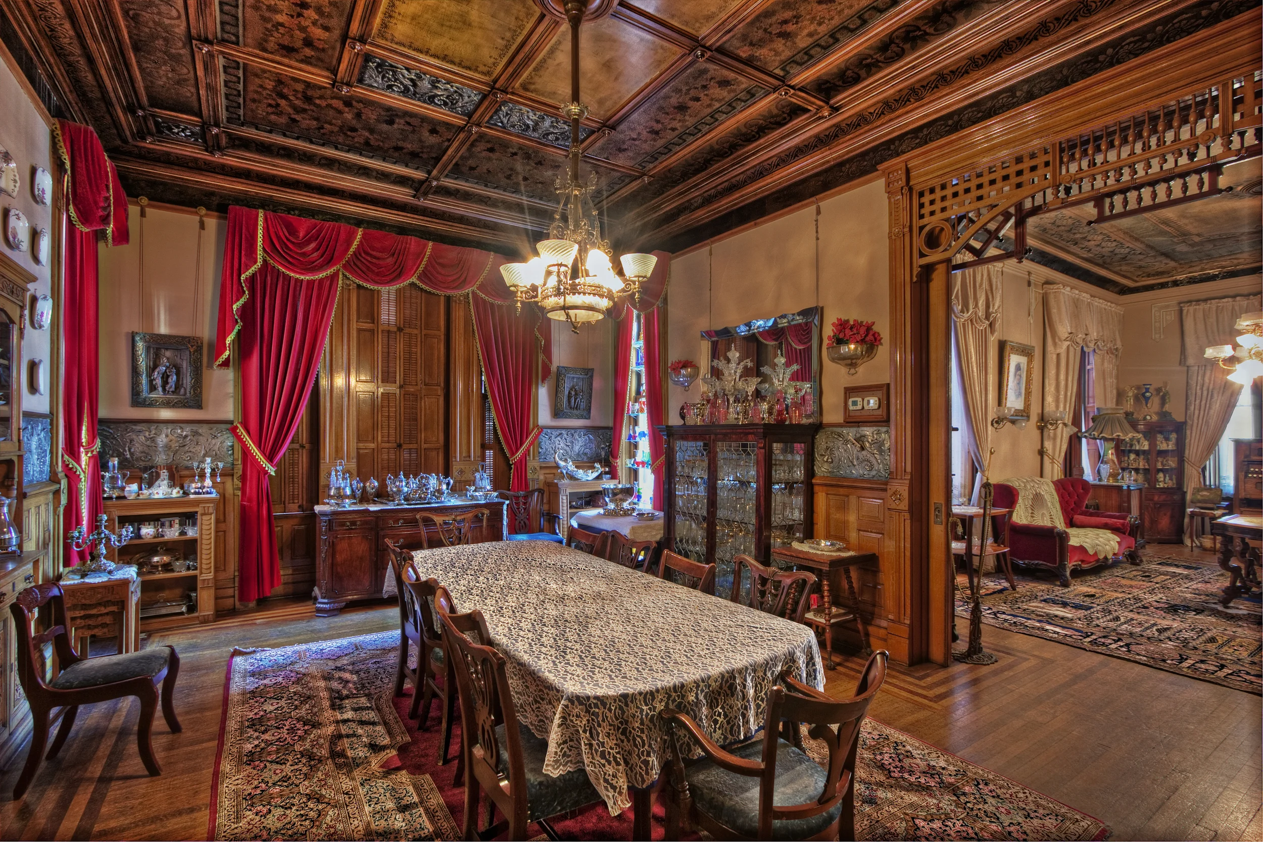 Dining room, Copper King Mansion, the W.A. Clark home in Butte, Montana. From the dining room, floor-to-ceiling windows led to a wraparound porch, allowing the men to step out to smoke cigars while discussing business and politics. c. Daniel Hagerman. Prints for sale at http://fineartamerica.com/art/all/copper+king+mansion/all.