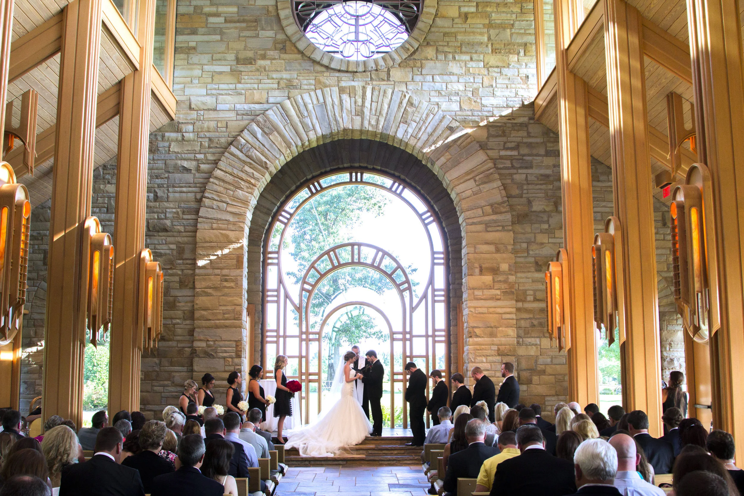 ABOVE: Ashley & Brian held their ceremony at the Hunt Chapel in Rogers, AR. 