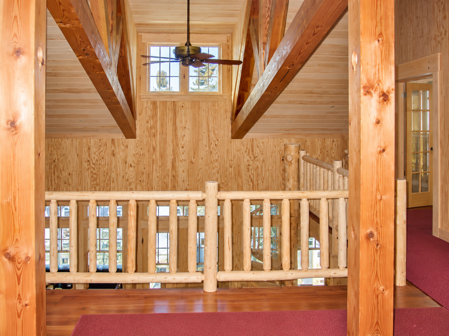 Rustic Loft Balcony with Cedar Beams.png