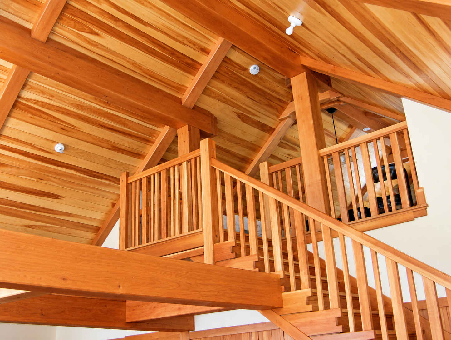 Warm Wood Loft with Vaulted Beams.png
