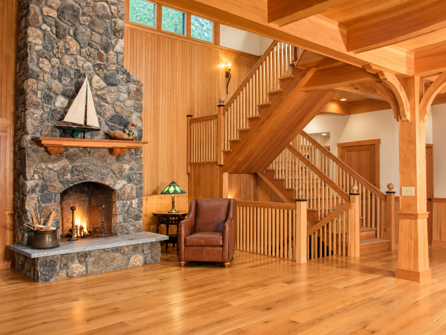 Rustic Lodge Fireplace and Stairway.png