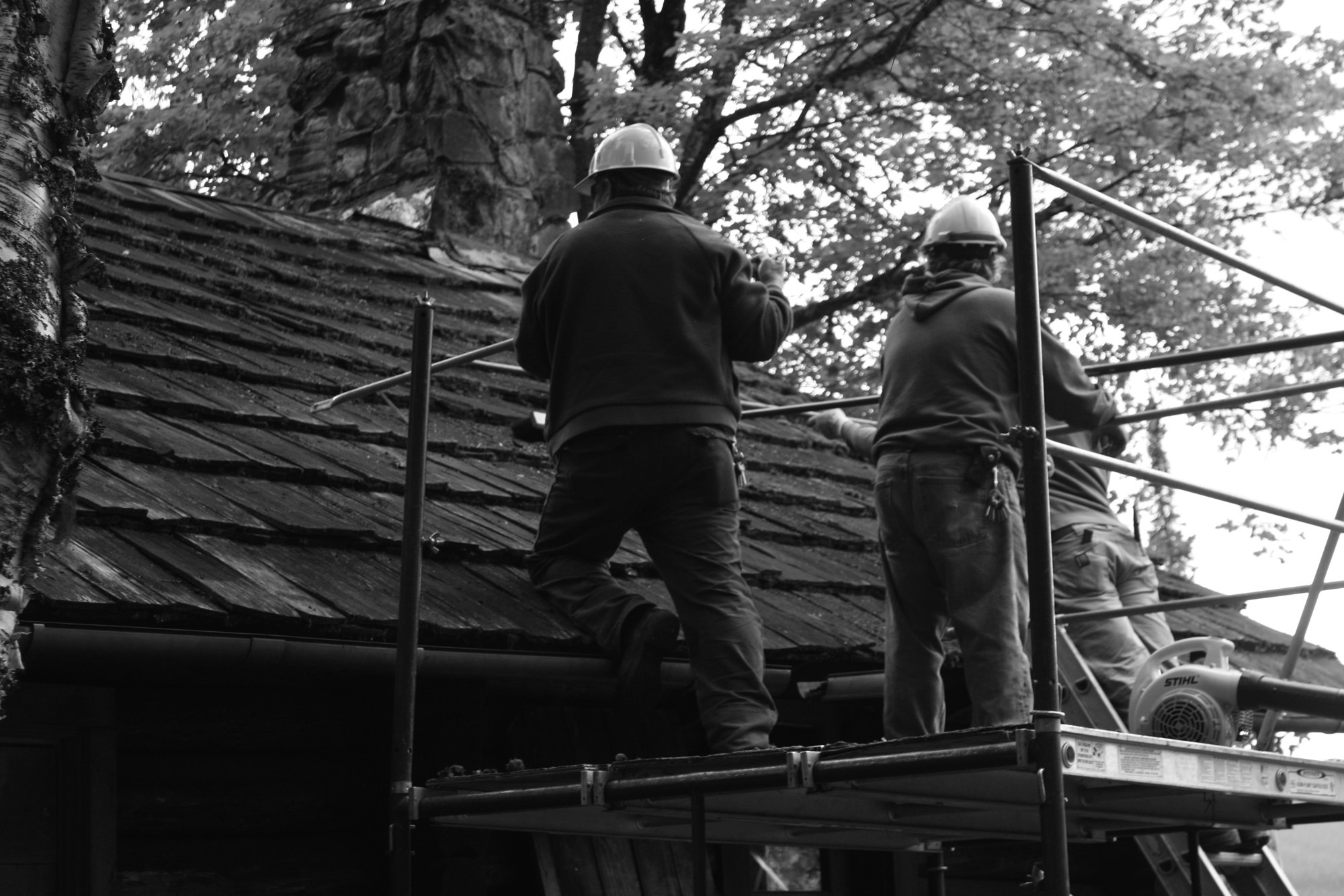 Last summer, maintenance crews carefully scraped years of moss off the shingles at the Wheeler Camp in Glacier National Park. 