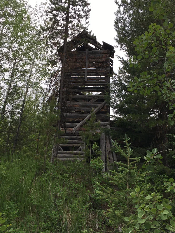 Water tower at the Kintla Ranch. In 1947, Matt Brill sold the Kintla Ranch to the Wilson family. Larry Wilson remembers hauling water from the tower and firewood to each guest cabin each morning.