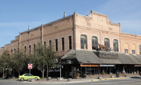 John McIntosh built Opera House Square in 1896 in bustling downtown Kalispell. The building to the north housing Norm’s News was added in 1903.