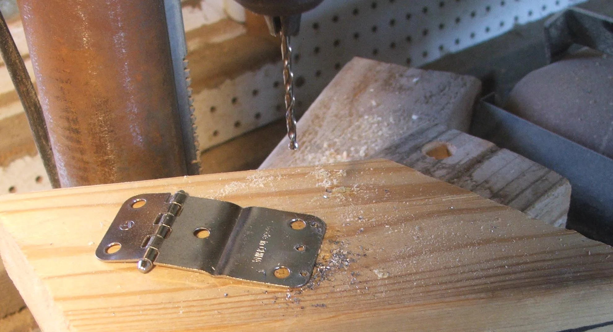 Drill holes for the strings