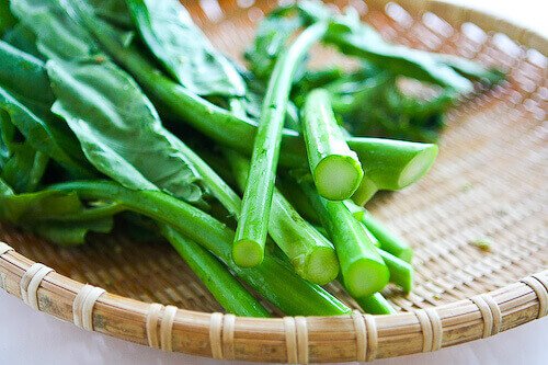Chinese Broccoli or Gai Long - A dark green vegetable in the Brassica oleracea group. This vegetable produces characteristic florets of flowers, much like broccoli. The floret, stem and leaves can be eaten raw in salads, steamed, boiled or the most common stir fried with oyster sauce. The oyster sauce compliments the faint bitterness of the plant. 