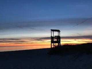 One place that brings me joy- the beach. Winter at sunset. I love the colors of the sky.