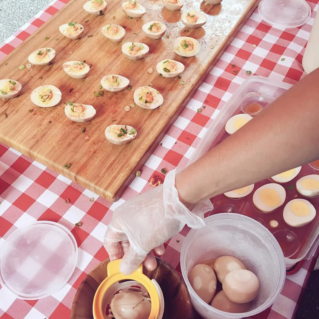 Dana, our Catering Manager, in action with "dinosaurs" eggs as she likes to call them!