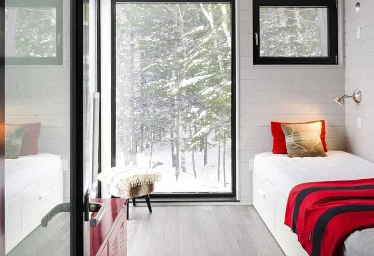 An interior shot of their vinyl windows - the German hardware allows for both tilting and casement swing - fantastic!