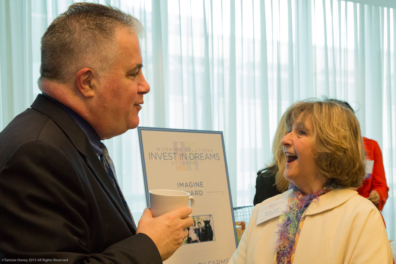 Working Solutions Board Chairman Peter Goetze of First Bank and 2014 Invest in Dreams awardwinner Mary Ann Maggiore of Maggiore Communications