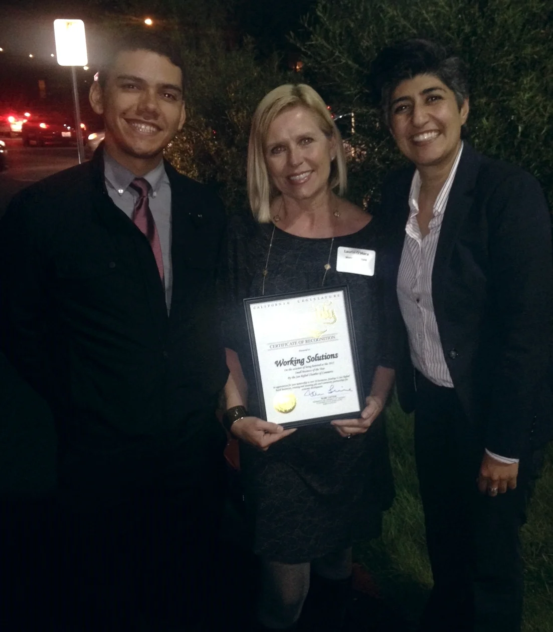 ROberto Hernandez, Laurie O'Hara and Sara Razavi of Working Solutions were thrilled to receive the award on behalf of Working Solutions' staff and Board of Directors