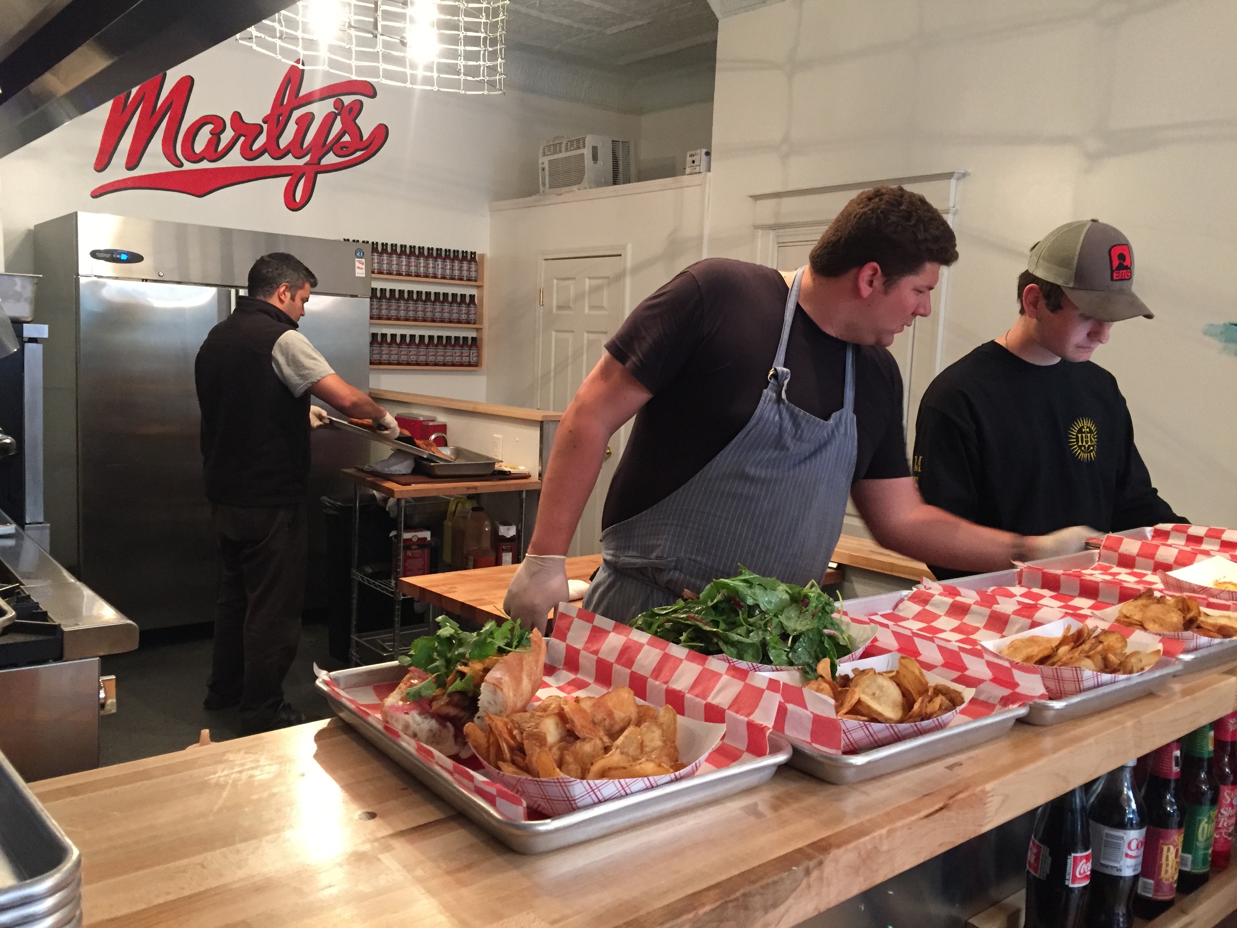 Marty & team working their magic in the kitchen.