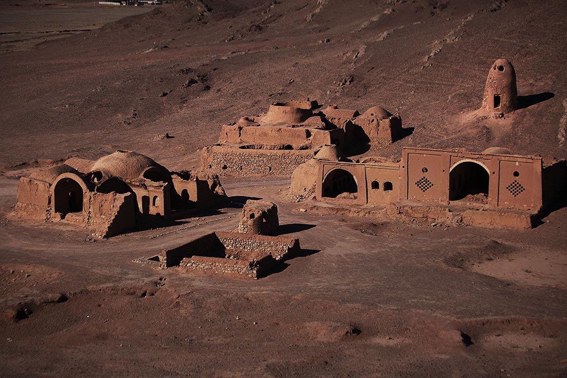 View from a Dakhma, a "Tower of silence" in Cham . One of the last Zoroastrian village in Iran. Close to Yazd . Buildings can be seen below were used to prepare the body after death.