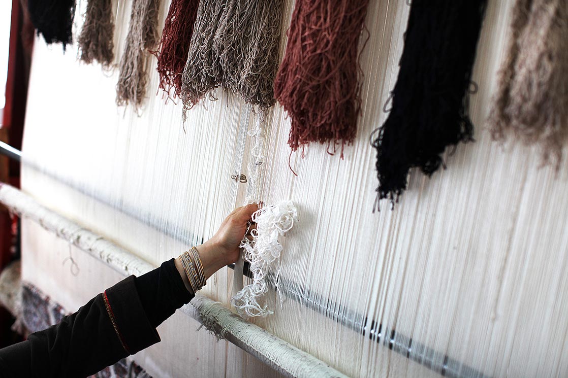 A carpet weaver at Samarkand | UZBEKISTAN