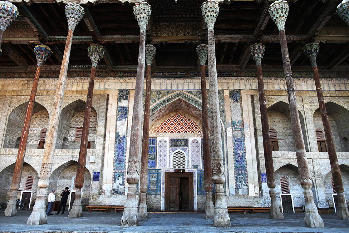 Bala Havuz mosque (1712) is noted for the profuse colors and carvings on the wooden columns of its porch and its ceiling. The joinery of its painted ceiling features extraordinary craftsmanship with the use of suspended weights, semi-circular arches and balusters | UZBEKISTAN