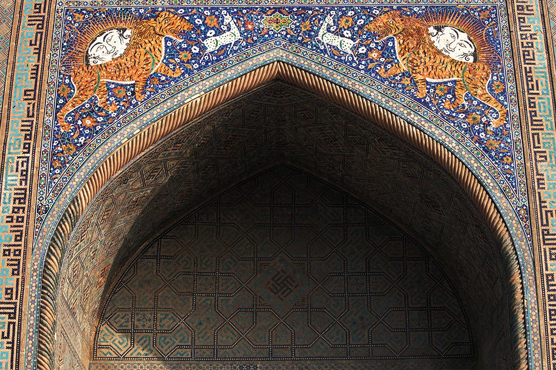 Frontage of Sher-Dor Madrasah in Registan . It was a public square and a place of public executions. It is framed by three madrasahs (Islamic schools) of distinctive Islamic architecture | UZBEKISTAN