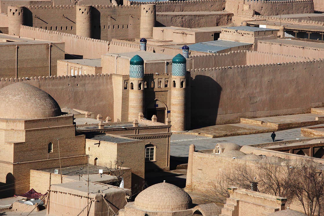 Khiva is a city located in Chorezm Province. According to archaeological data, the city was established in the beginning of the current era. Itchan Kala is encircled by brick walls, whose foundations are believed to have been laid in the 10th century. Present-day crenellated walls date back to the late 17th century and attain the height of 10 meters | UZBEKISTAN
