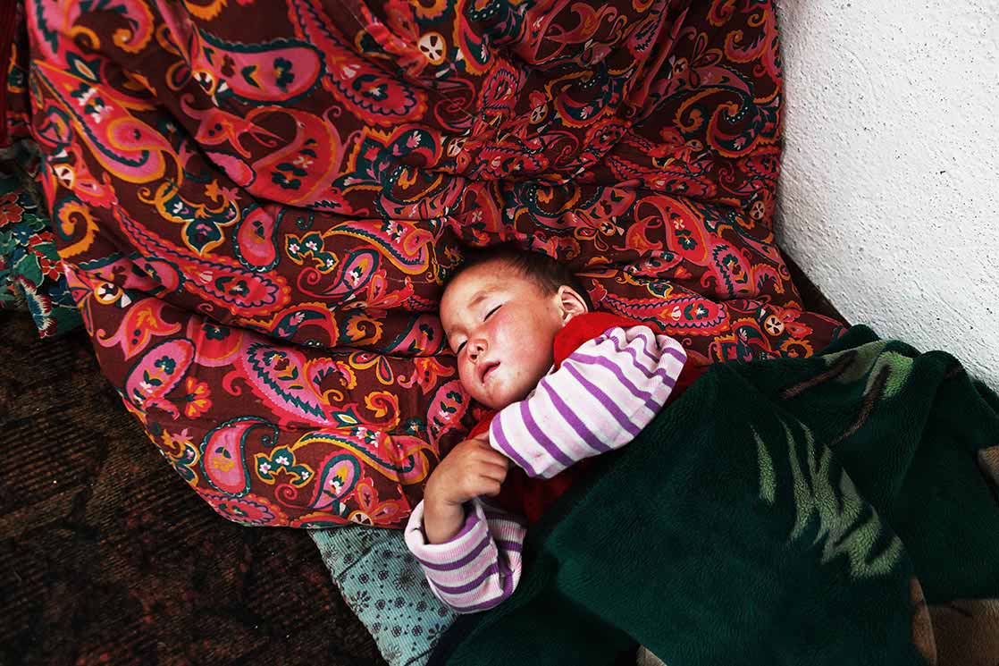 Kyrgyz nomadic baby , Kyrchyn pasture | KYRGYZSTAN