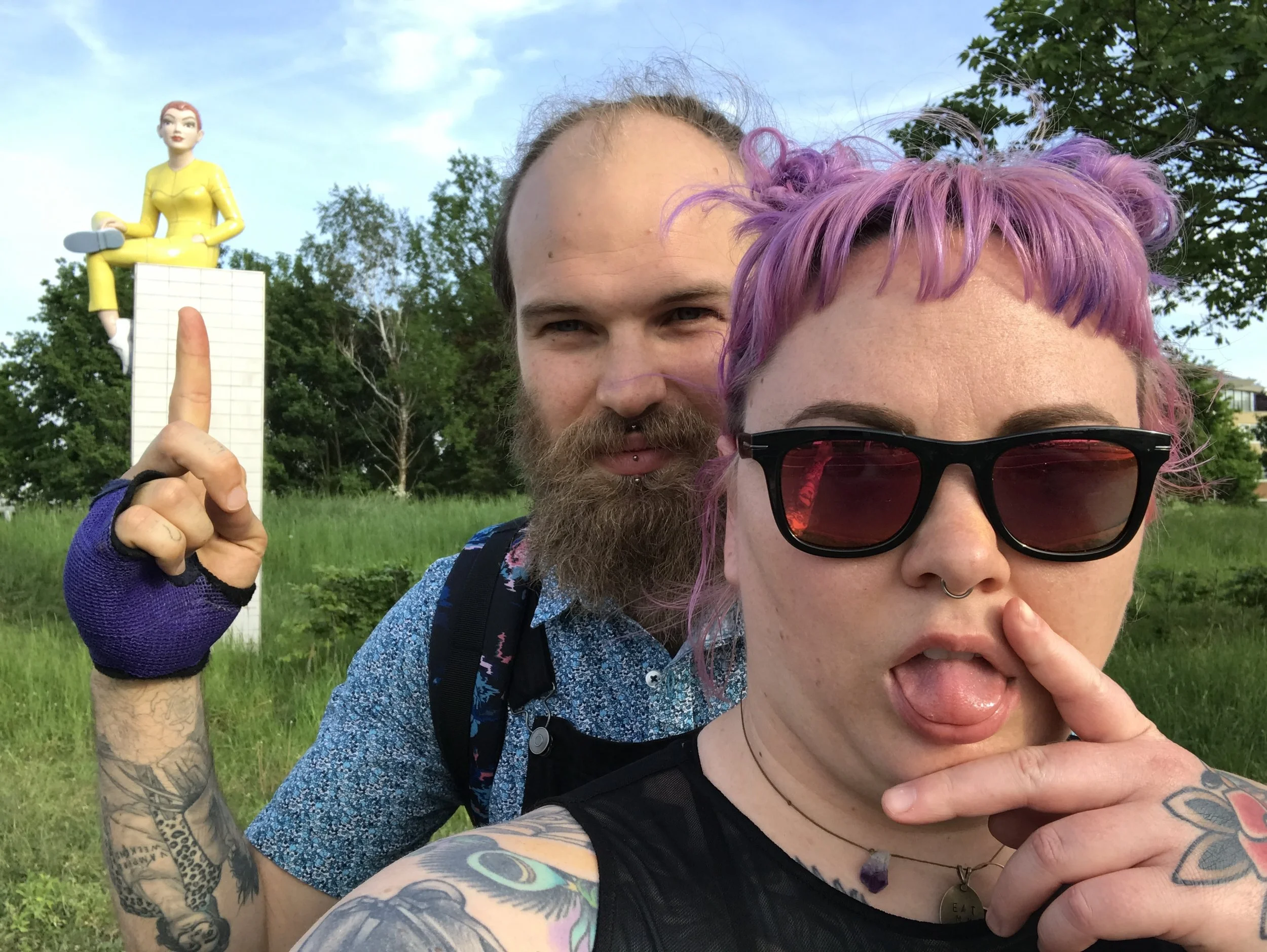 Here's a statue of a lady in Lisse. She's wearing a yellow body suit and seems to have a shaved head. Not strange at all. 