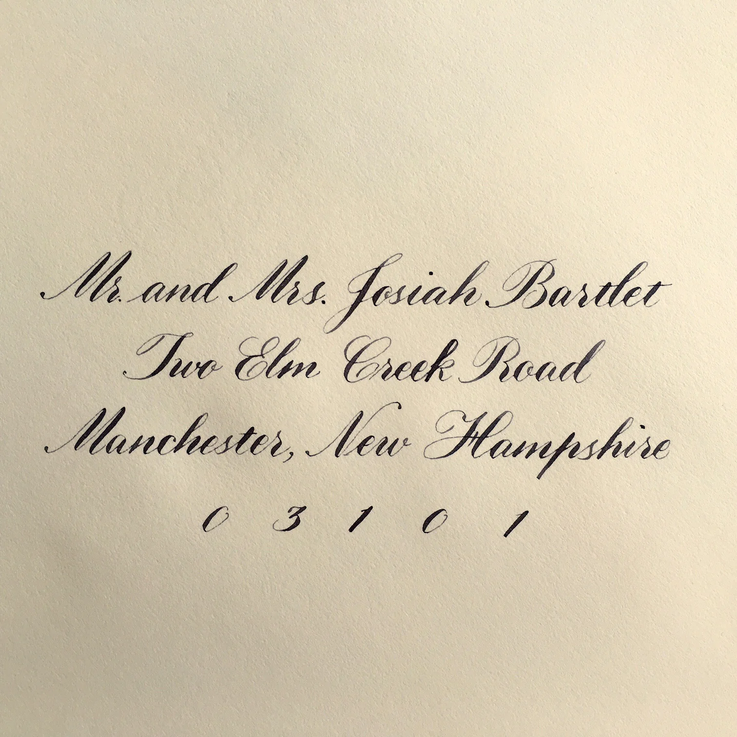 Envelope addressed in a simplified interpretation of Copperplate.