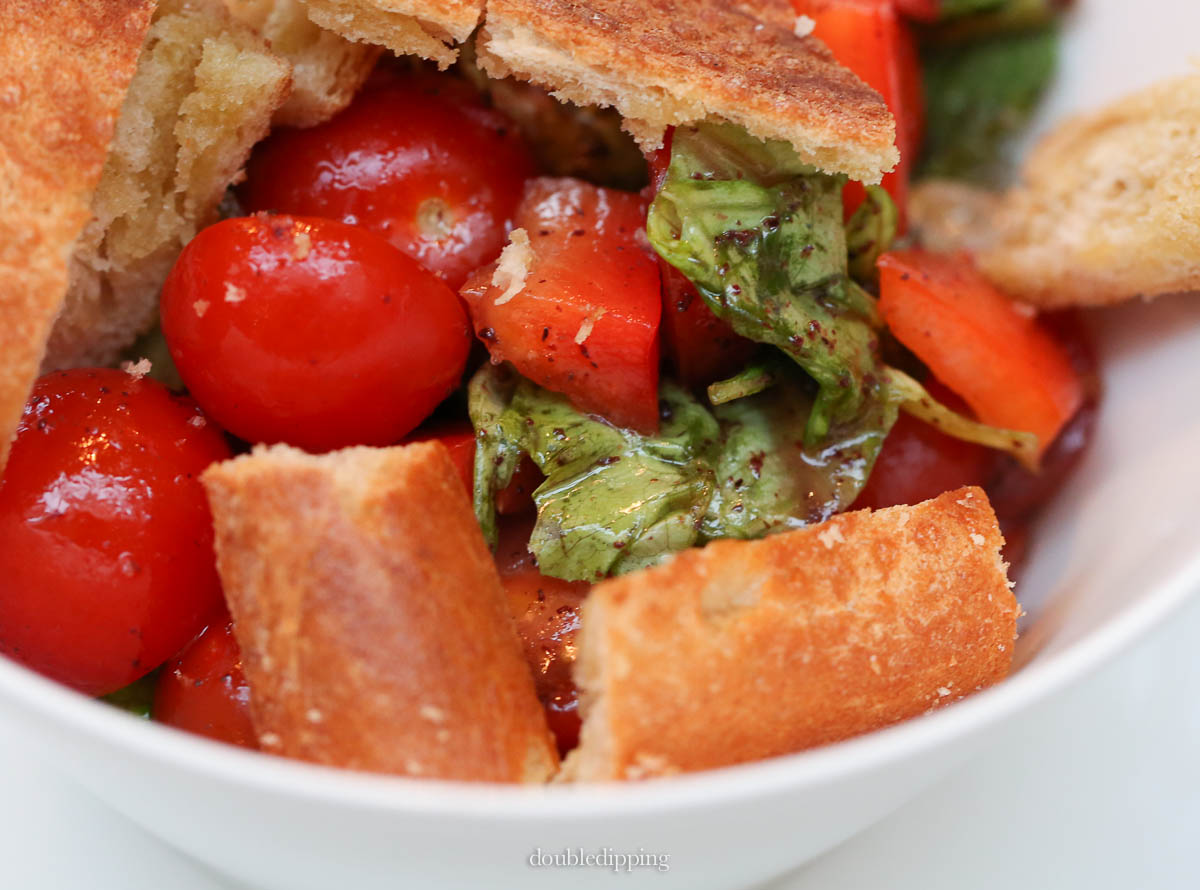 The bread must be toasted well and added last just before serving, so it won't get soggy with the dressing