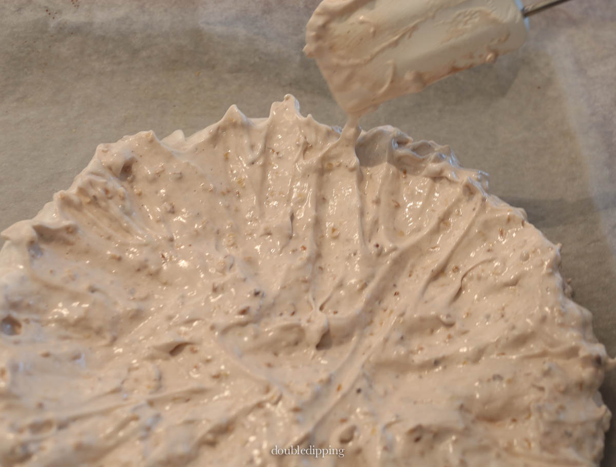 Line a baking sheet with parchment paper shape the mixture to form a base for your cake in your preferred size