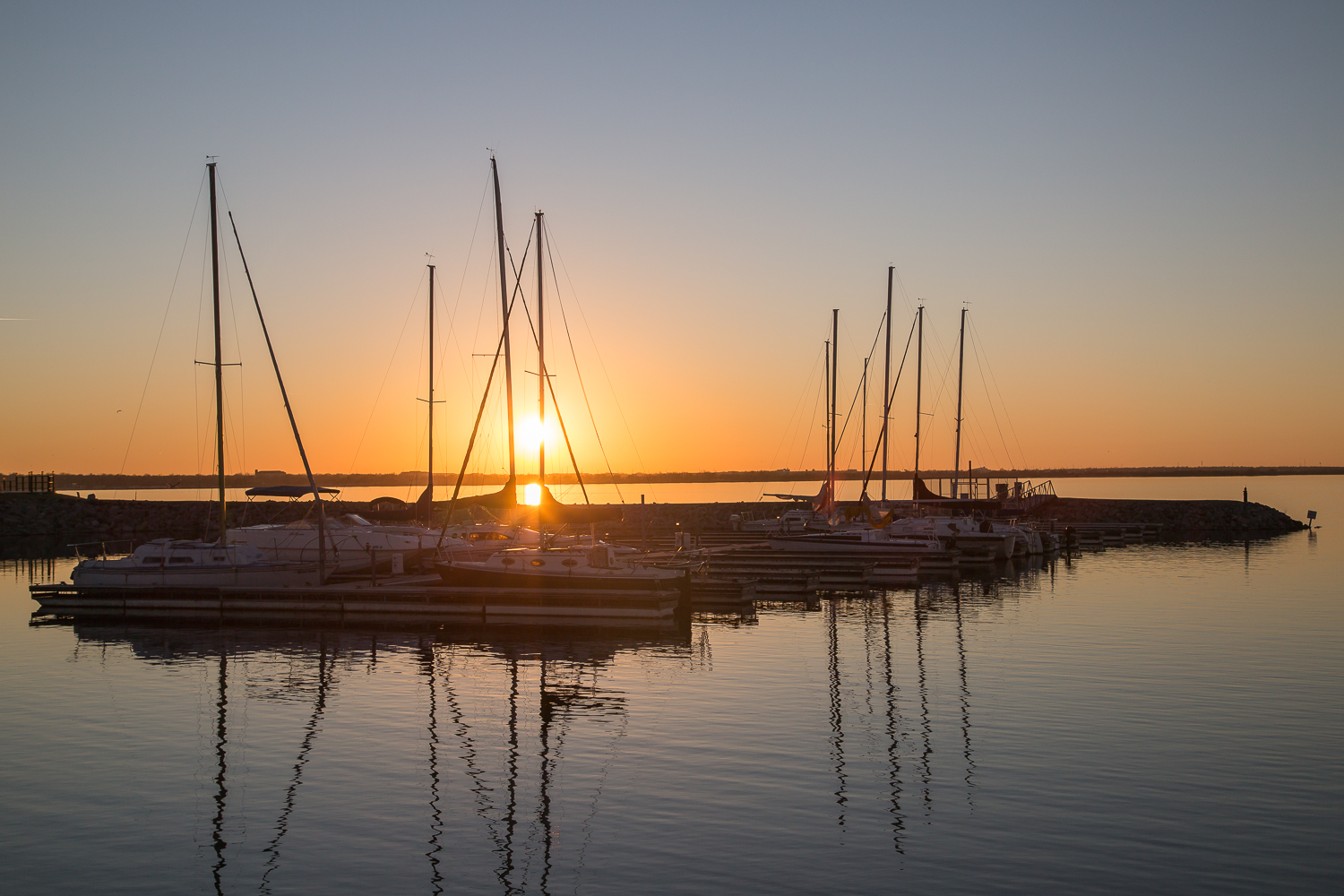 Sunset over sail boats