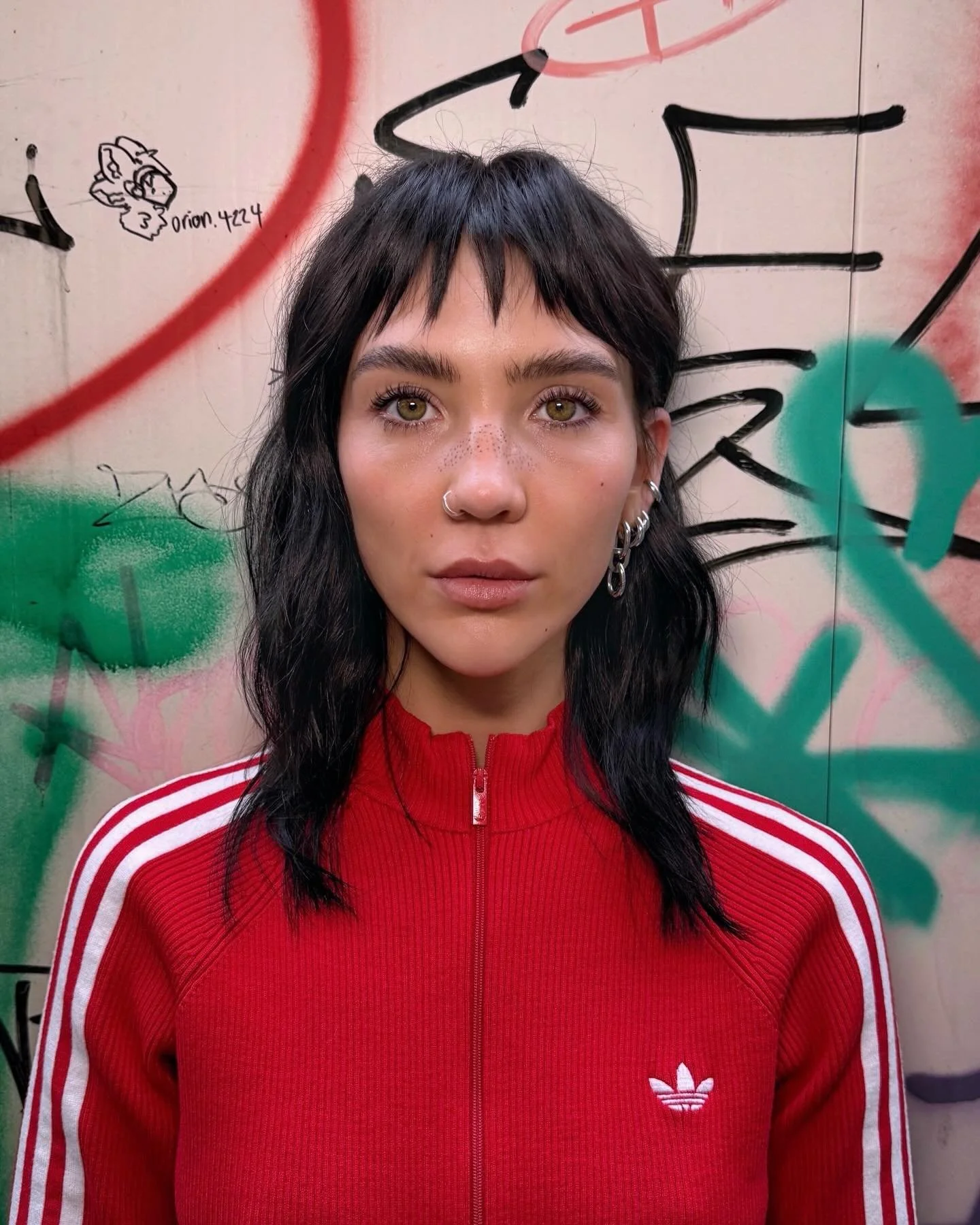 Long dark textured layers with a short fringe and face-framing pieces