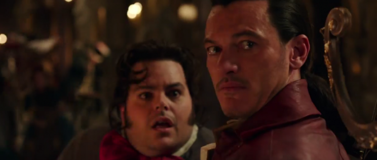 Lefou (Gad) and Gaston (Evans)