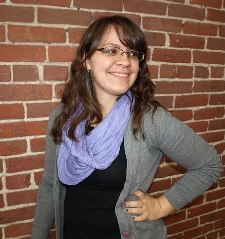 Cat at Puppet Showplace in 2014, in her role as Audience Services Manager.