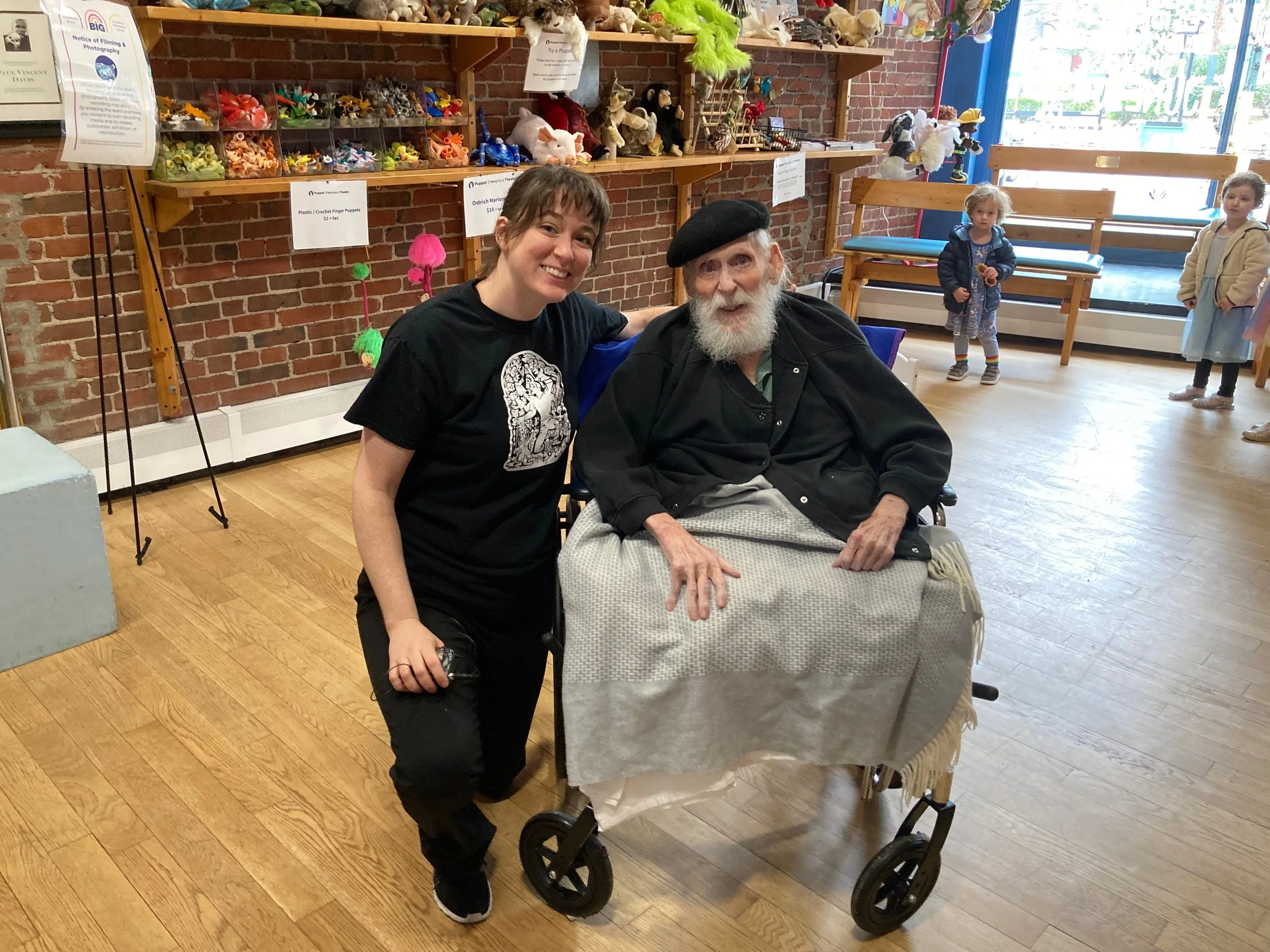 Paul Vincent Davis poses with Puppet Showplace’s current resident artist, Sarah Nolen, after the premiere of her latest show, June 2025.