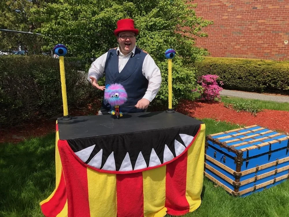 Monster+Circus+Puppeteer,+Puppet,+and+stage+outdoors.jpeg