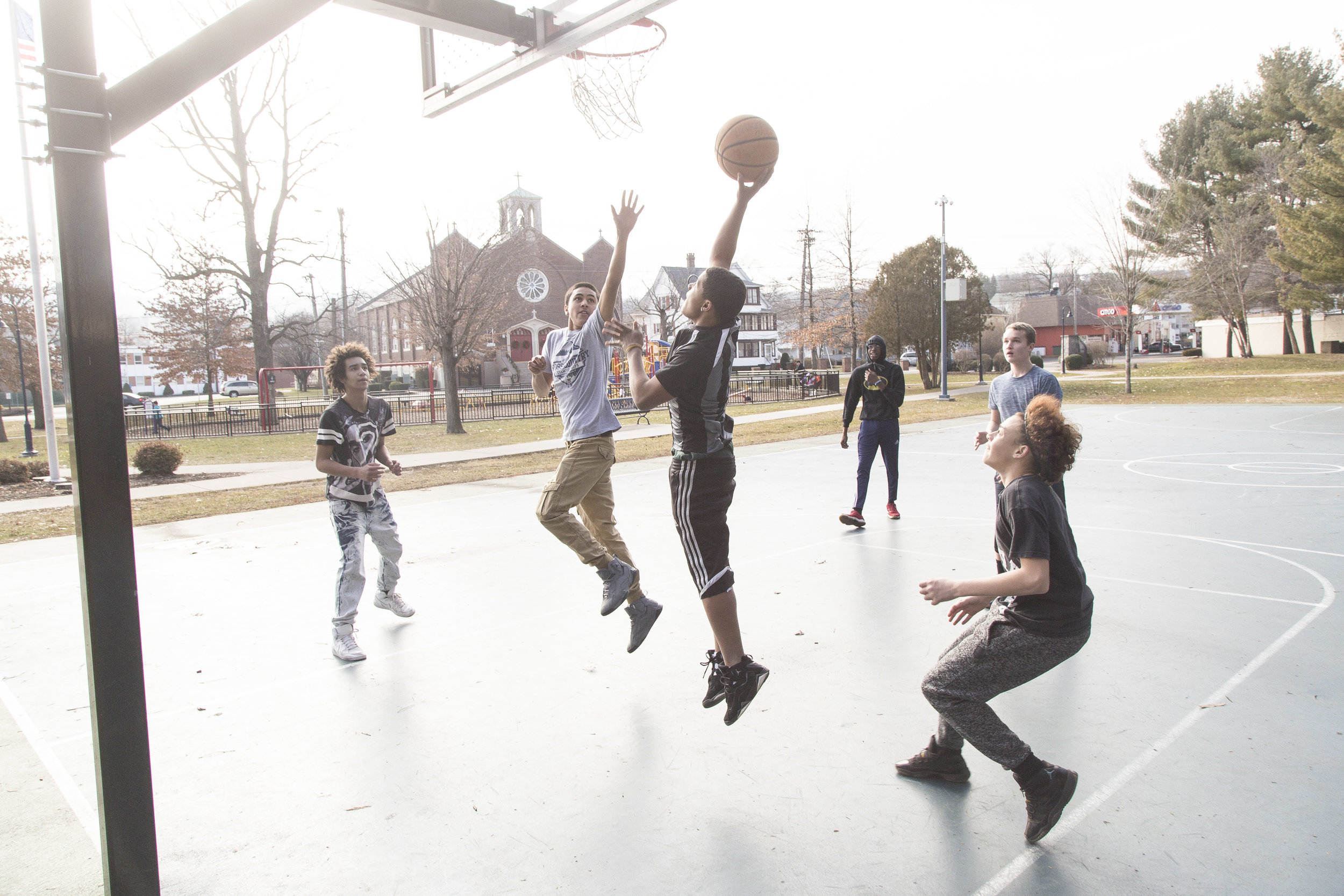 Young men in Bristol take advantage of a 55-degree day in January.