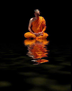 Buddhist monk meditation on Water.jpg