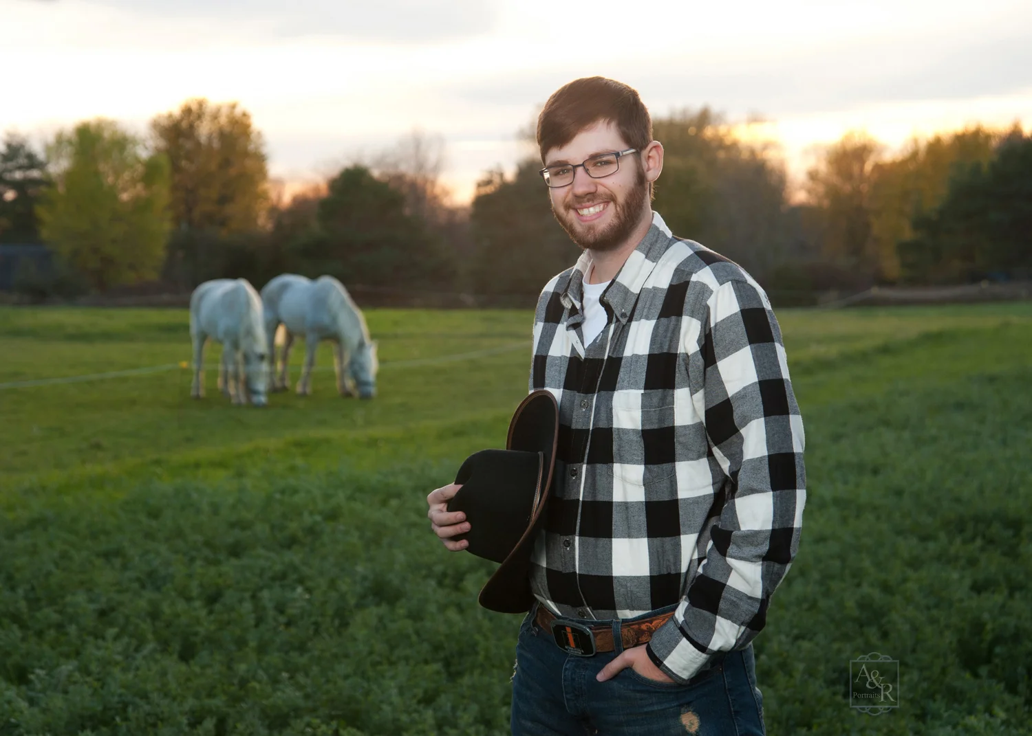014 senior guy with horses.jpg