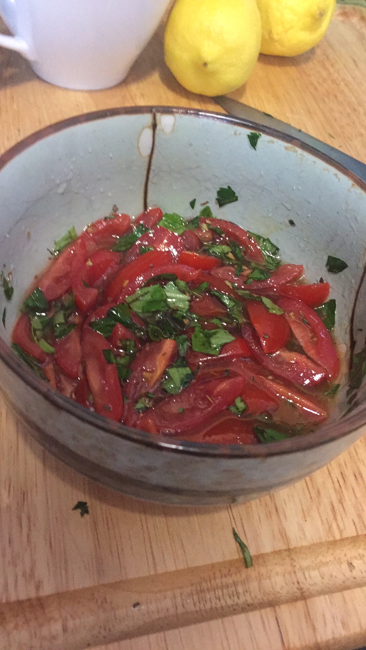 This cherry tomato salad is perfect when you have a shit load of cherry tomatoes yet you don't want to use them in a typical salad. I added a little flava to the traditional recipe by adding olive oil, fresh parsley, and fresh basil! Ingredients 12 oz. grape tomatoes 3 tablespoons olive oil 2 tablespoons cider vinegar 1 teaspoon parsley 1 teaspoon basil McCormick Basil Leaves 1 teaspoon dried oregano 1/2 teaspoon salt 2 teaspoons white sugar Directions In a small bowl or cup measure, mix together oil, apple cider vinegar, herbs, salt, and sugar. Pour dressing over cherry tomatoes in a serving dish, and gently stir to coat. Chill for at least 2 hours. Gently stir from bottom to top, coating all tomatoes, before serving