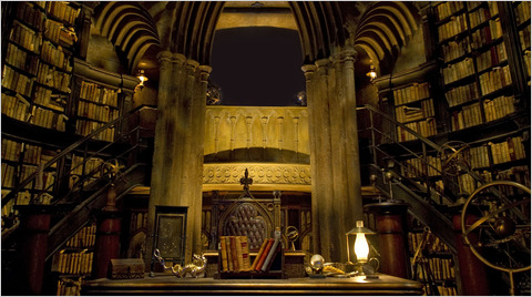 Dumbledore's office, during the tour of this, Harry, Ron, and Hermonie are in Harry's invisibility cloak. It was pretty rad hearing those characters again!