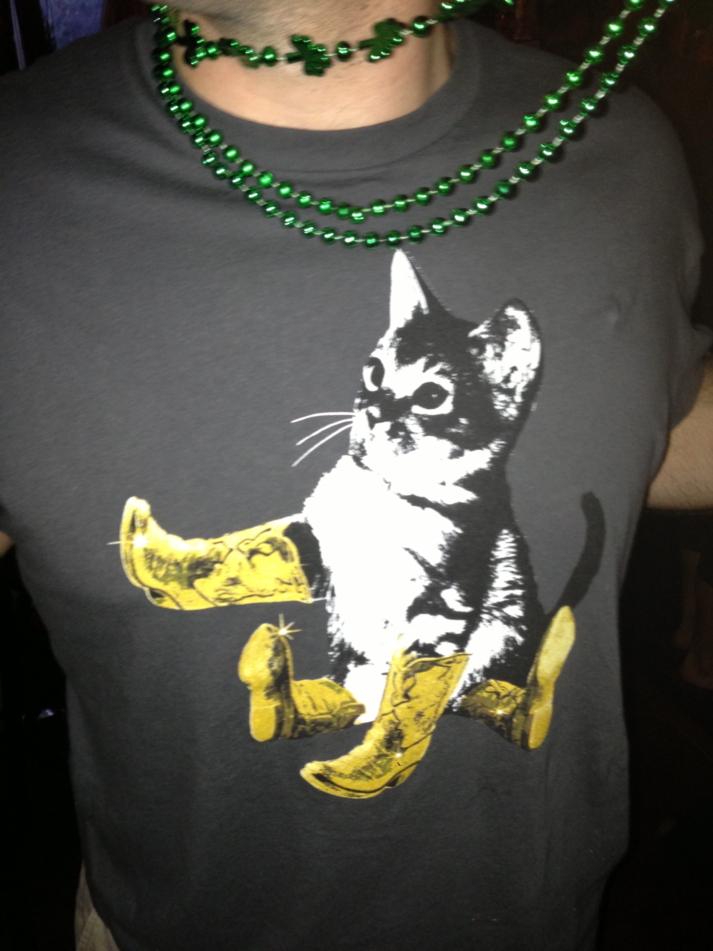 Those would be St. Patty's beads worn for the "daytime Birthday bash"