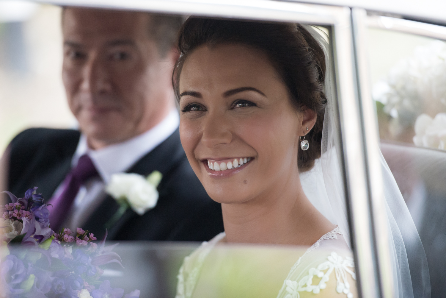 Bride and her father arriving at Rockingham Castle wedding